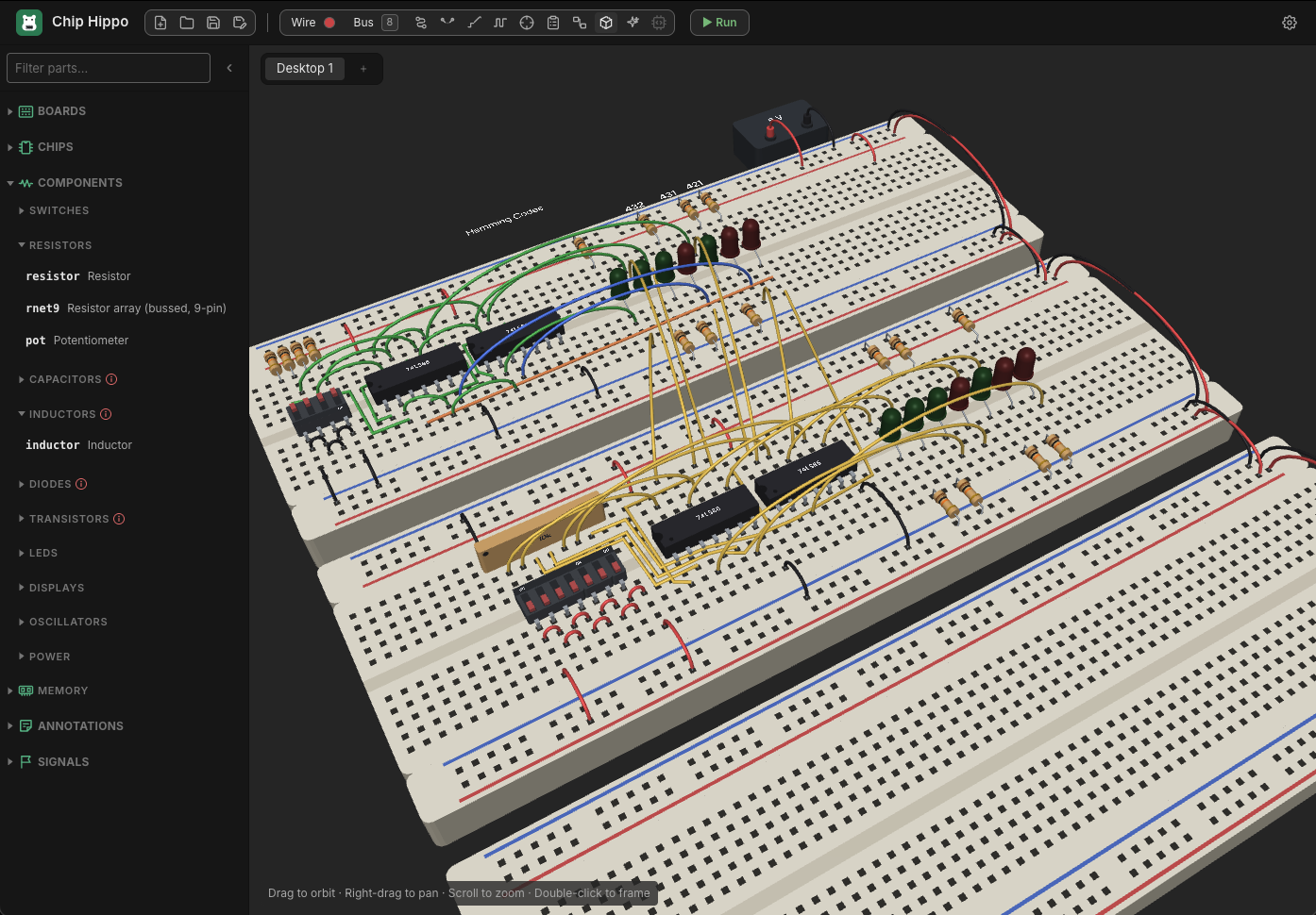 A Hamming-code circuit in the 3D view: stacked breadboards seen in perspective, with 74LS chips, LEDs, resistors and a DIP switch bank under arching jumper wires. The parts tray beside it lists the Capacitors, Inductors, Diodes and Transistors groups.