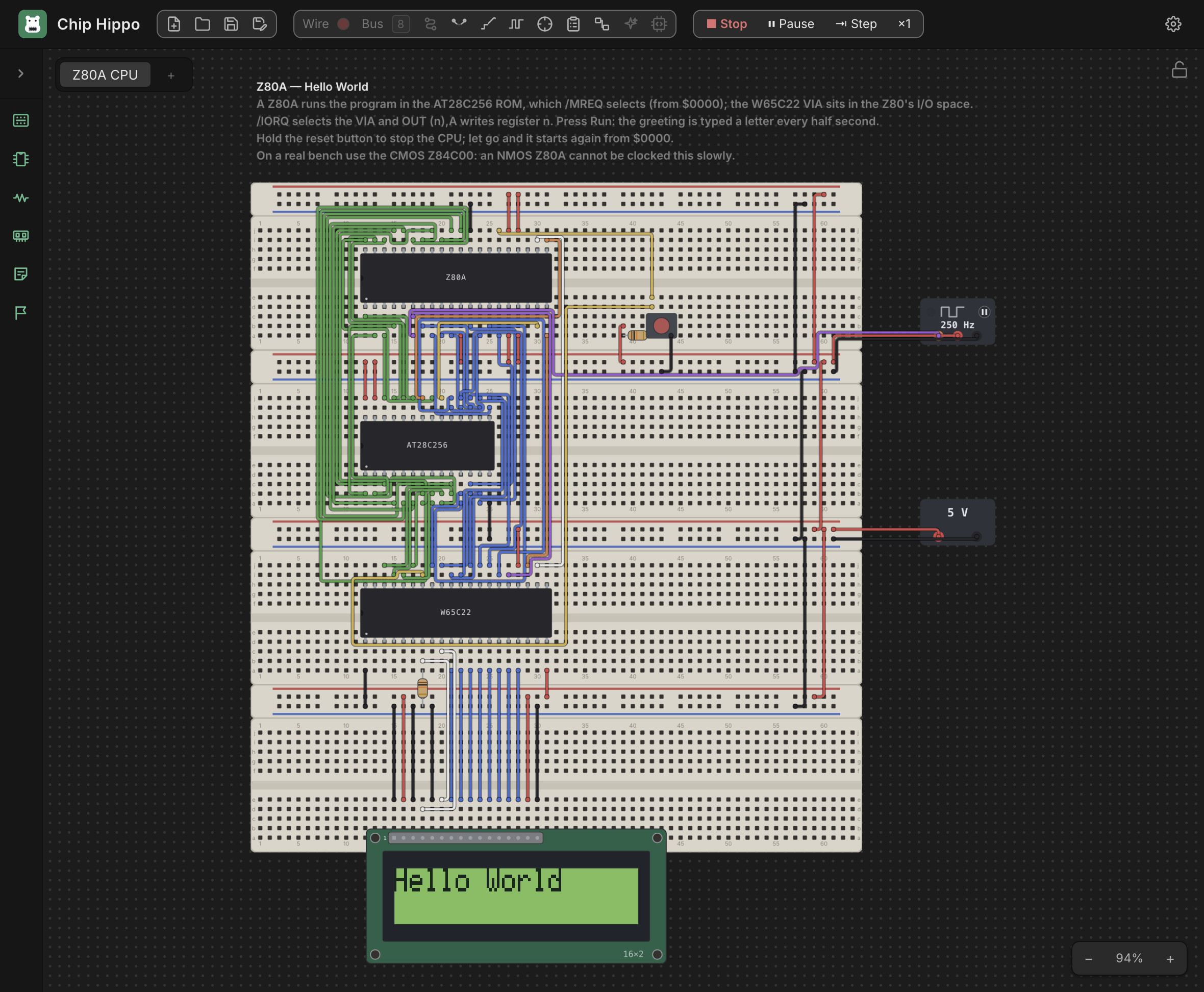 The Z80A Hello World computer running in Chip Hippo: a Z80A CPU, an AT28C256 EEPROM and a W65C22 VIA across four stacked breadboards, their address and data buses auto-routed in neat board-aligned runs, clocked at 250 Hz from a 5 V supply, and a 16x2 character LCD reading Hello World.